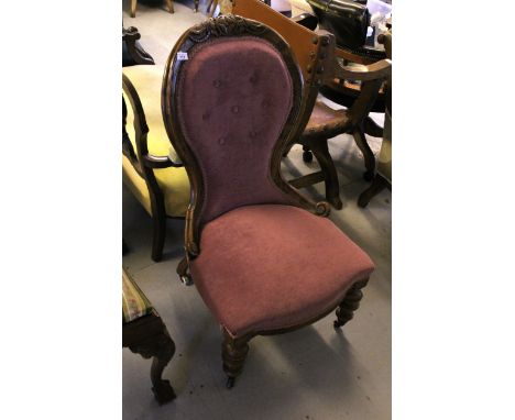 19th Century walnut spoonback drawing room chair on turned tapering front supports with casters