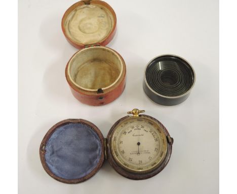 19th Century pocket telescope housed in a red leather box, together with a 19th Century pocket barometer, housed in a leather