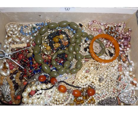 Large collection of beaded necklaces, other jewellery, diamante brooches, etc., inc. faux amber and bakelite bangle