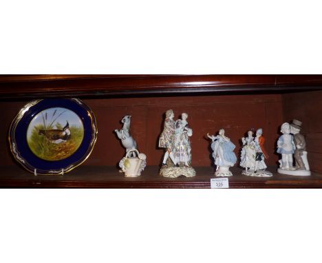 Three Continental porcelain figurines and other ceramics (one shelf)