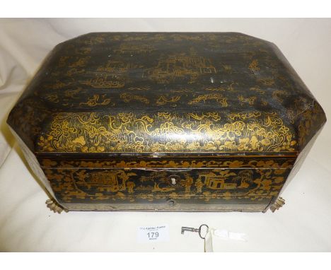 Large Chinese mid 19th c. black and gold Chinoiserie sewing chest containing assorted sewing tools, needle cases, thread and 