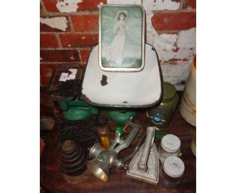 Set of old kitchen scales, a mincer, flat iron, etc.