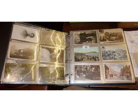 Large album containing 300+ vintage and older postcards
