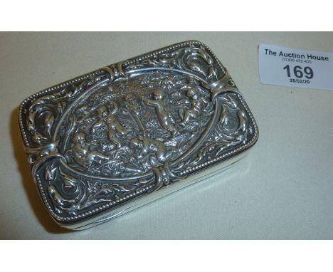 Victorian silver snuff box decorated with repoussé scenes of cherubs, and gilt-lined, hallmarks rubbed, measuring approx., 3"