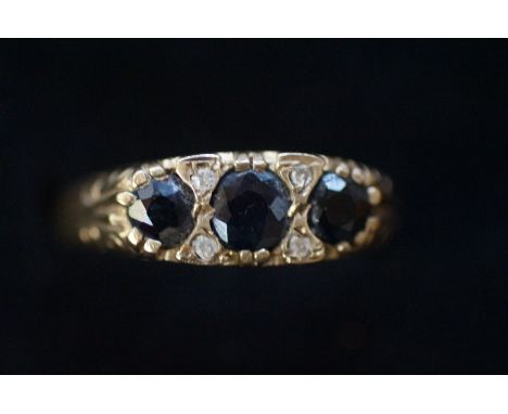 9ct Gold Dress Ring set with Blue Stones - Size R