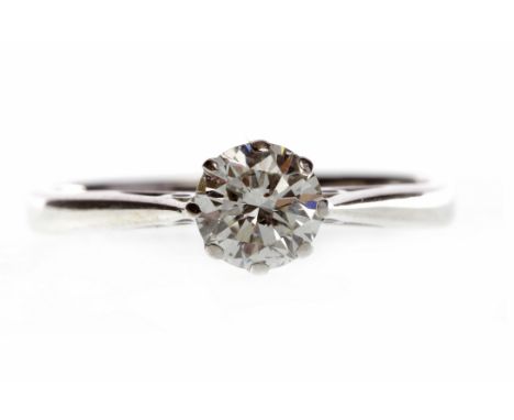 DIAMOND SOLITAIRE RINGset with a round brilliant cut diamond of approximately 0.54 carats, in eighteen carat gold, size K, 2.