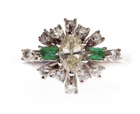 EIGHTEEN CARAT WHITE GOLD EMERALD AND DIAMOND CLUSTER RINGset with a central marquise cut diamond of approximately 0.40 carat