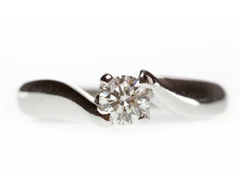 EIGHTEEN CARAT GOLD DIAMOND SOLITAIRE RINGset with a round brilliant cut diamond of approximately 0.32 carats, on crossover s