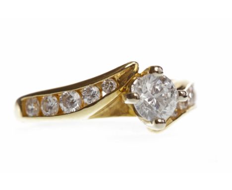 EIGHTEEN CARAT GOLD DIAMOND SOLITAIRE RINGwith a four claw set round brilliant cut diamond of approximately 0.41 carats on ch