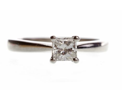 PLATINUM DIAMOND SOLITAIRE RINGwith a four claw set princess cut diamond of approximately 0.25 carats, size J-K, 4.1g