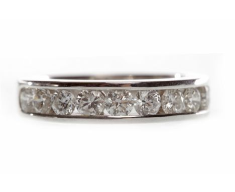 EIGHTEEN CARAT WHITE GOLD DIAMOND HALF ETERNITY RINGwith channel set round brilliant cut diamonds totalling approximately 0.9