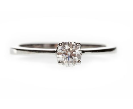 EIGHTEEN CARAT GOLD DIAMOND SOLITAIRE RINGwith a round brilliant cut stone of approximately 0.29 carats, size J-K, 2.3g