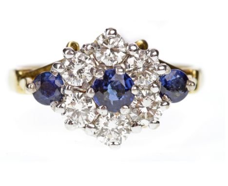 EIGHTEEN CARAT GOLD DIAMOND AND SAPPHIRE RINGset with round sapphires and diamonds in a rhombic formation, size K-L, 4.4g