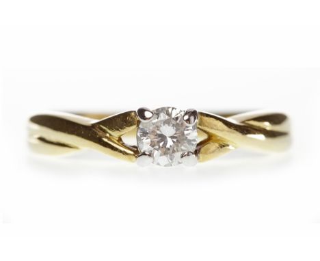 EIGHTEEN CARAT GOLD DIAMOND RINGset with a round brilliant cut diamond of approximately 0.24 carats, on crossover style shoul