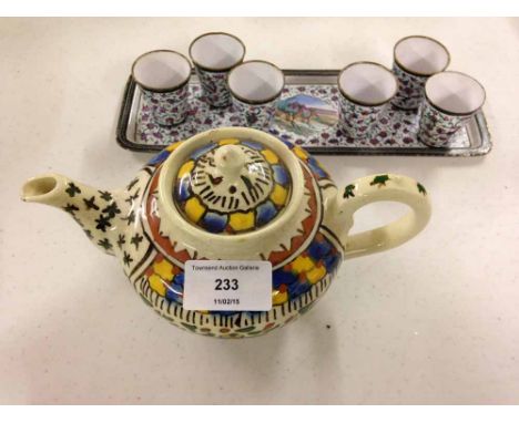 A Persian enamelled tray & miniature cups - late 19th century with a Persian tin glazed teapot early 20th century.