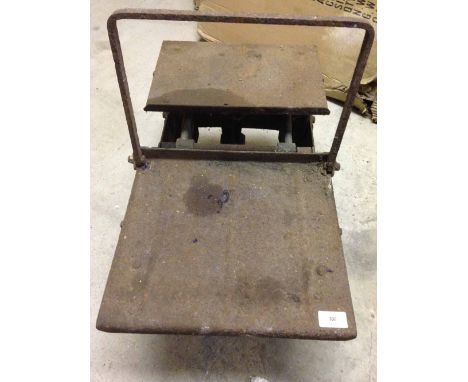 Vintage cast iron potato scales.