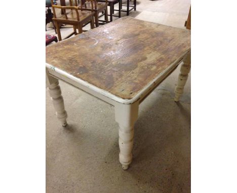 A vintage pine kitchen table white painted legs. 4' x 3'.