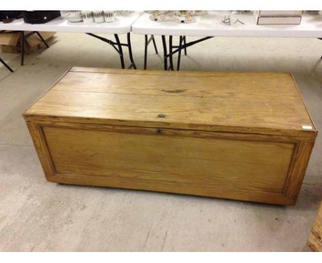 A large vintage pine linen chest on casters. 54 x 143 x 62cm.