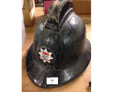 Vintage London Fire Brigade firemans helmet.