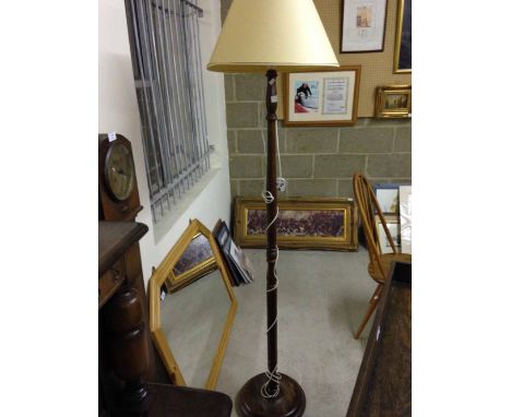 Turned wood lamp standard.