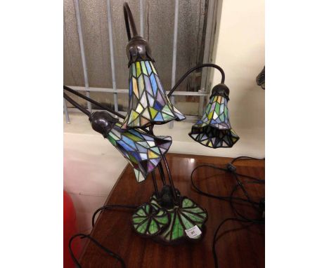 Reproduction Art Deco style table lamp with 3 arms, each with Tiffany design lamp shades and base designed as lily pads. 50cm