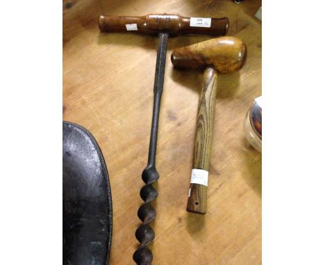 2 vintage wooden tools - a large hand drill and a plumbers lead dressing mallet with oval lignum vitae head.