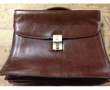 A vintage Texier French leather briefcase.