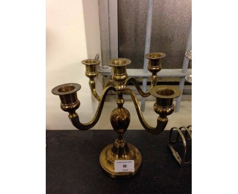 A vintage brass 5 sconce candelabra