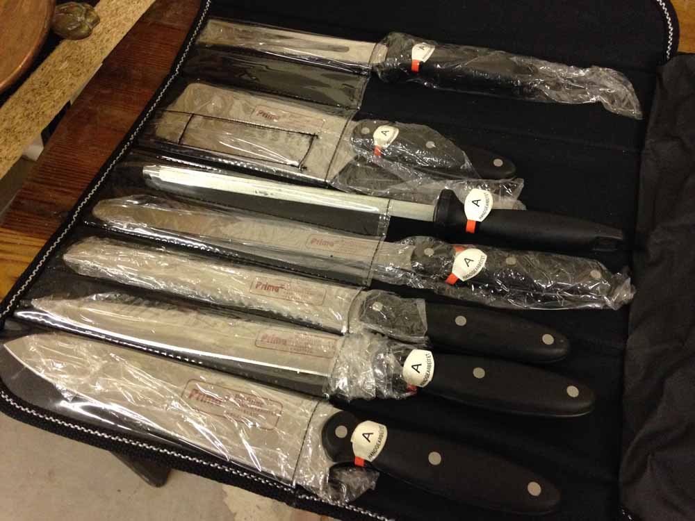 A set of chef's knives by Prima in soft case.