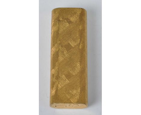 Cartier of Paris - a gold plated pocket lighter, having engine turned decoration and typical hinged cover, stamped Cartier Pa