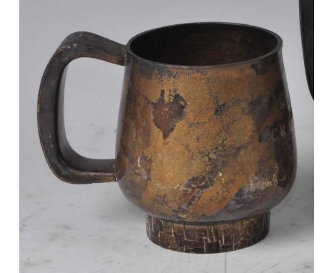 A 1970s silver squat tankard, having engine turned and heightened geometric abstract decoration, engraved CR from LR, maker J