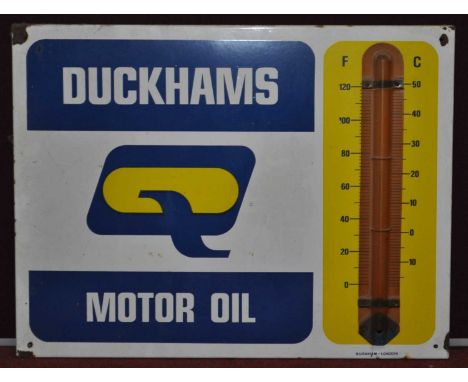 An enamel on metal thermometer advertising sign for Duckhams Motor Oil, manufactured by Burnham of London, blue, white and ye