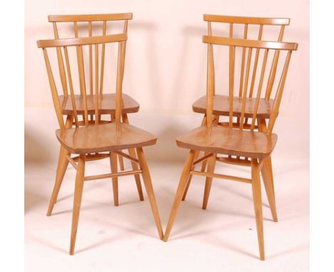 A set of four Ercol blond elm stickback kitchen chairs, each on turned supports, w.38.5cm