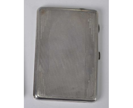 An Art Deco silver engine turned pocket cigarette case, having stepped piped corner detail, gilt-washed interior, maker BM &a