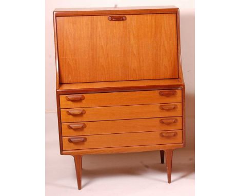 A 1960s G-Plan teak writing bureau, the hinged compartment with single shelf, over four long drawers, raised on curved taperi