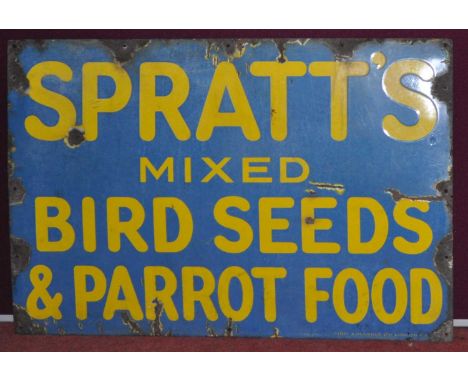 An early 20th century enamel on metal advertising sign for Spratt's Mixed Bird Seeds &amp; Parrot Food, manufactured by Wood 