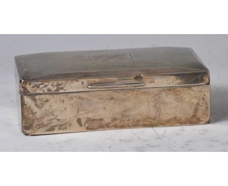 An Art Deco silver table cigarette box, having an engine turned faceted cover, enclosing cedar lined interior, maker Alfred D