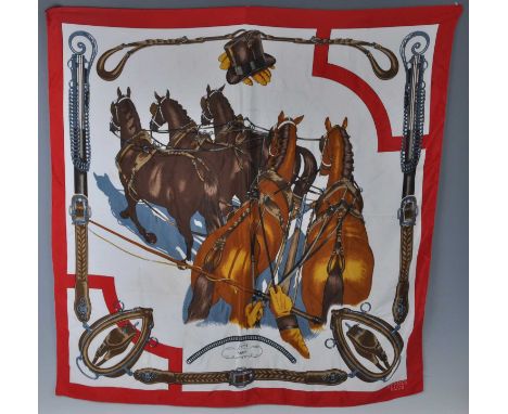 A vintage Hermès of Paris silk scarf, with horse-drawn central decoration, 85 x 83cm