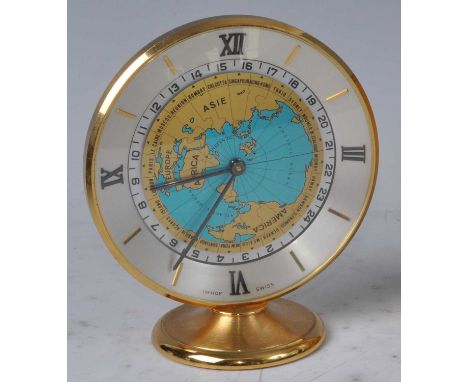 An Imhof Hours of the World brushed and lacquered brass desk clock, manual wind with 24 different timezones, stamped number 1