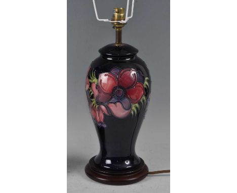 A Moorcroft pottery table lamp, in the Anemone pattern, of upper baluster form, underglaze painted and tube-line decorated, r