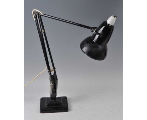 Herbert Terry - a black painted anglepoise desk lamp, of typical hinged rotating form, on two-step square base, with opposing