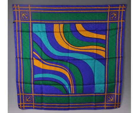 A Rolex Oyster silk scarf, bright colour decorated with all-over repeating Rolex monogram, approx 86 x 86cm, with original ca