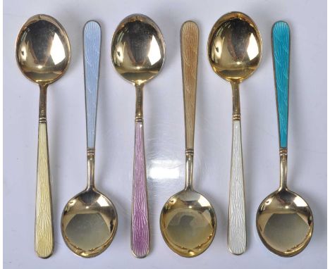 A set of six 1930s Finnish sterling silver and enamel teaspoons, each gilded, varying coloured enamel to each side of handle 