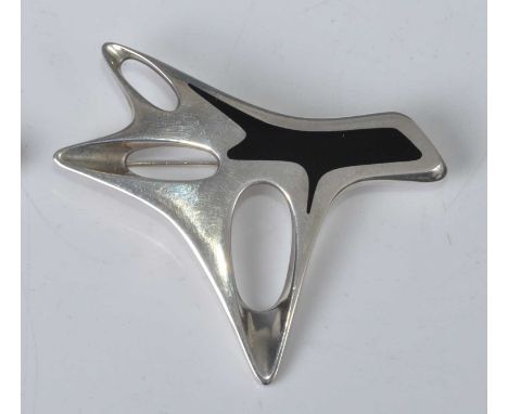 Henning Koppel for Georg Jensen - a sterling silver black enamel decorated brooch, of pierced abstract form, stamped marks an