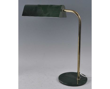 A 1970s brass and green enamel painted desk lamp, the adjustable shade raised on curved rod column, h.45cmCondition report: S