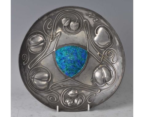 Archibald Knox for Liberty &amp; Co - an English pewter and enamel inset dish 'The Bollenllin', typically floral stylised dec