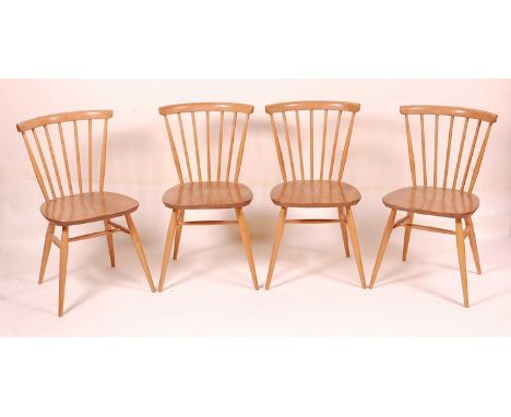 A set of four Ercol blond elm stickback kitchen chairs, each raised on typical turned supports, w.44cm