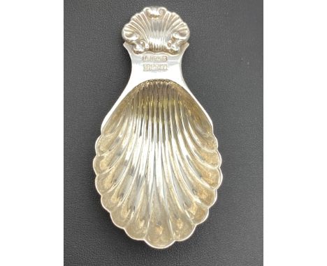 A Cartier silver tea caddy spoon, Birmingham 1973