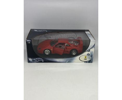 A Ferrari F40 model car, Hotwheels, 1;18 scale, never been opened
