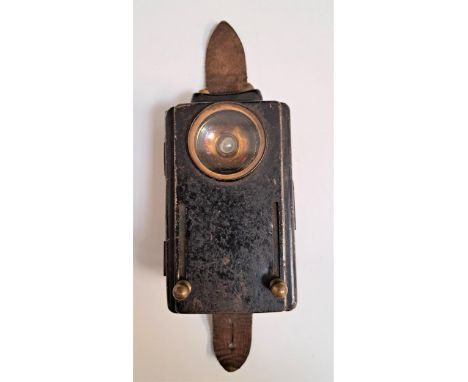 WWII BRITISH MILITARY SIGNAL LAMPwith a circular lens and light above a red and green slide lens, the case marked D.B.Ltd, L.